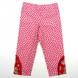 Pantalon bébé fille en velours rose avec points rouges et découpe fantaisie papillon