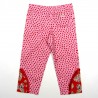 Pantalon bébé fille de dos en velours coton rose et découpe fantaisie au bas des jambes